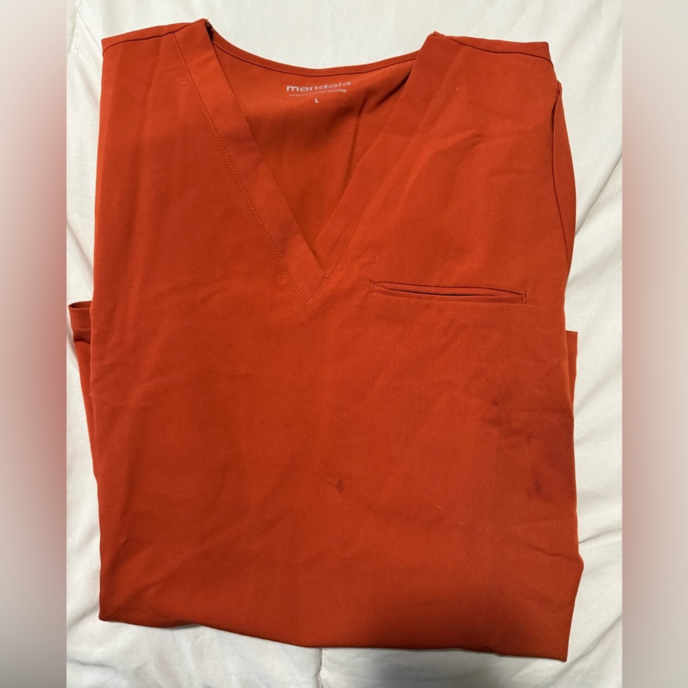 Burnt orange scrub top